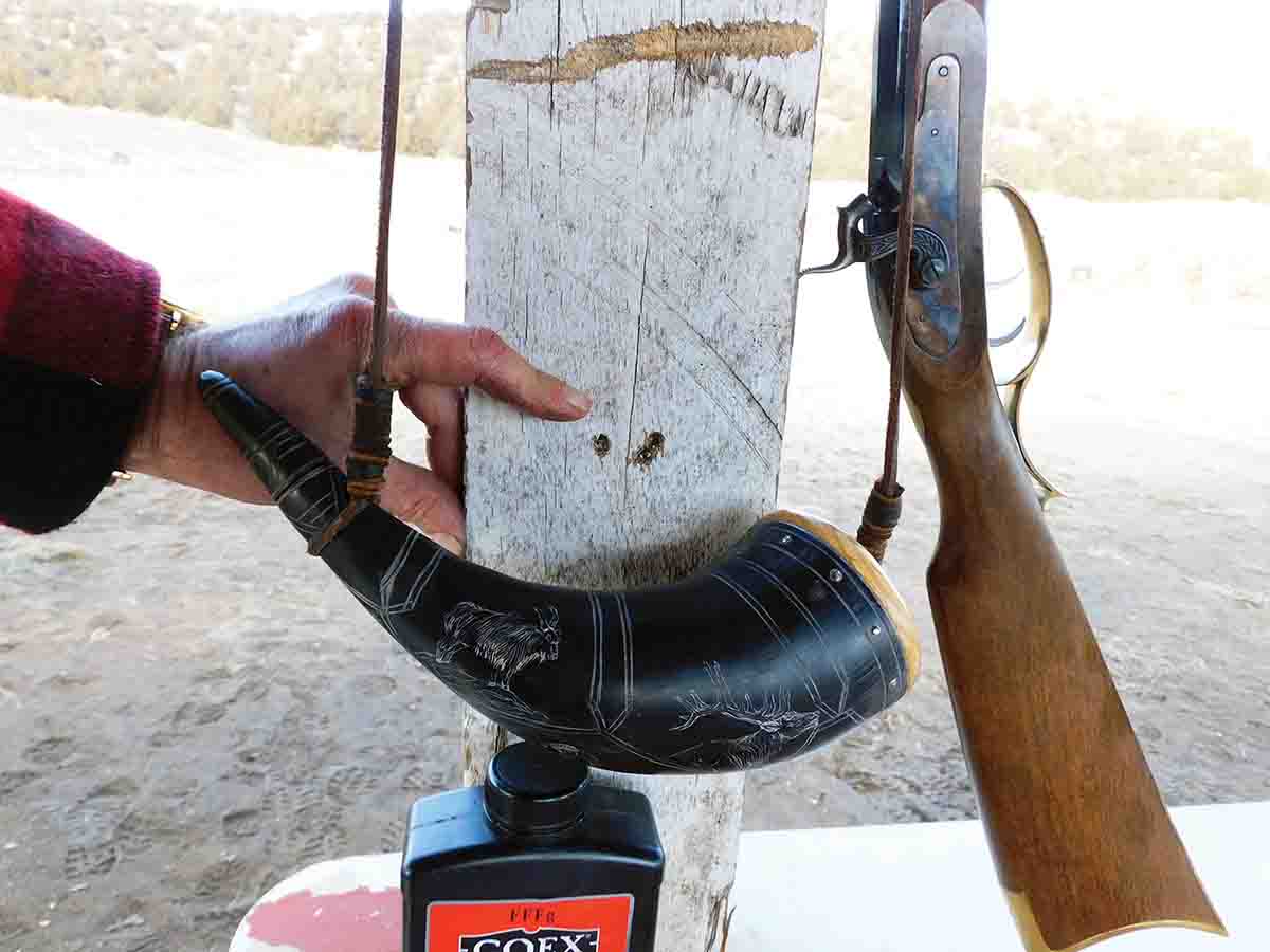 Three roundballs fired into this old fence post yielded a penetration of 1.1 to 1.3 inches with 30 grains of powder and a patched roundball.